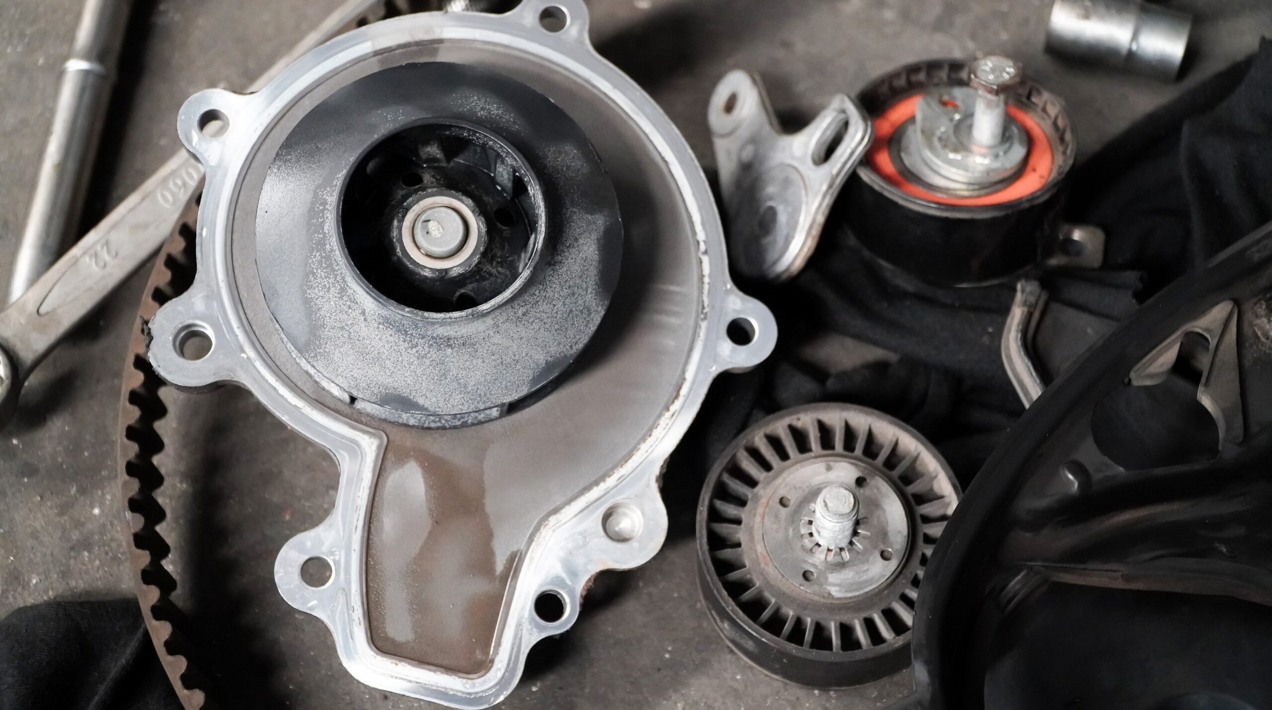 Same Teardown, Two Repairs: Why a Timing Belt and Water Pump Together Can Save About $210